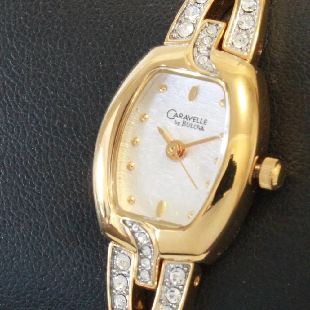 Caravelle Ladies Gold Tone Quartz Watch, MOP Dial, ½ Bangle Bracelet 16mm